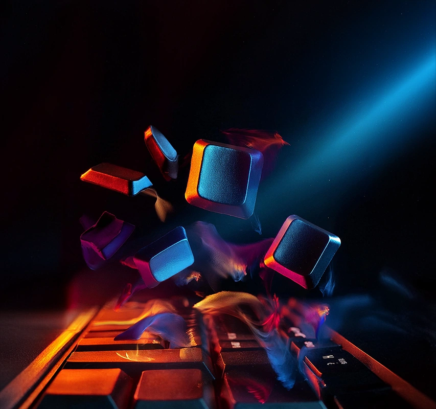 opas.hero-keyboard-scandit-800x800 Keyboard keys in motion, illustrating differences between English and Finnish keyboard layouts.